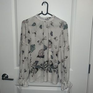White floral long sleeve LOFT blouse.